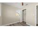Bedroom with open closet and neutral decor at 1609 Stocking St, Daytona Beach, FL 32117