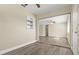 Bedroom with mirrored closet doors opening to living area at 1609 Stocking St, Daytona Beach, FL 32117
