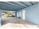 Covered carport with access to the front door at 1609 Stocking St, Daytona Beach, FL 32117