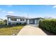 Charming ranch home with updated facade and landscaped yard at 1609 Stocking St, Daytona Beach, FL 32117