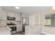 Modern kitchen with stainless steel appliances and island at 1609 Stocking St, Daytona Beach, FL 32117
