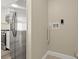 Small laundry area with hookups for washer and dryer at 1609 Stocking St, Daytona Beach, FL 32117