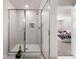 Clean bathroom with a large shower and neutral color scheme at 2033 Canny Cv, Winter Park, FL 32792