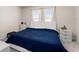 Spacious main bedroom with a king-size bed and ample natural light at 2033 Canny Cv, Winter Park, FL 32792
