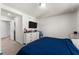 Well-lit bedroom with a queen-size bed and plenty of closet space at 2033 Canny Cv, Winter Park, FL 32792