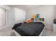 Bright bedroom with a large bed and plush bedding at 2033 Canny Cv, Winter Park, FL 32792