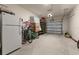 Attached garage with additional storage space at 2033 Canny Cv, Winter Park, FL 32792