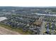 Aerial view of houses in a community with lakes and conservation at 2158 Stillwood Way, St Cloud, FL 34771