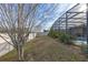 Screened pool and patio area with fenced backyard at 2158 Stillwood Way, St Cloud, FL 34771