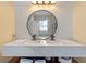 Double vanity bathroom with floating cabinets and large mirror at 2158 Stillwood Way, St Cloud, FL 34771
