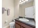 Clean bathroom with single sink vanity and toilet at 2158 Stillwood Way, St Cloud, FL 34771