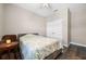 Bedroom with double bed, chair, and ceiling fan at 2158 Stillwood Way, St Cloud, FL 34771