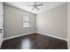 Empty bedroom with ceiling fan and window at 2158 Stillwood Way, St Cloud, FL 34771