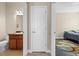 Hallway view of bathroom and bedroom with carpet at 2158 Stillwood Way, St Cloud, FL 34771