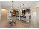 Modern kitchen with dark cabinets and an island at 2158 Stillwood Way, St Cloud, FL 34771