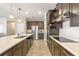 Modern kitchen with stainless steel appliances and large island at 2158 Stillwood Way, St Cloud, FL 34771