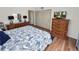 King-size bed, wood floors, and ample closet space at 230 La Casa # 230, Lake Wales, FL 33898