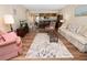 Spacious living room with views into the dining and kitchen areas at 230 La Casa # 230, Lake Wales, FL 33898