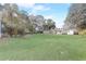Huge backyard featuring a large grassy area and mature trees at 2432 4Th St, Orlando, FL 32820