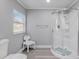 Bathroom with a walk-in shower and updated fixtures at 2432 4Th St, Orlando, FL 32820