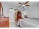 Stylish main bedroom with en suite bathroom access and a large dresser at 2432 4Th St, Orlando, FL 32820