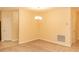 Bright dining room with neutral walls and carpet at 3444 Berkshire Woods Ter, Deltona, FL 32725