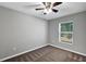 Spacious bedroom with carpet flooring, ceiling fan, and a window at 43 Water Track Dr, Ocala, FL 34472