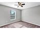 Bright bedroom with carpeted floors and ceiling fan at 43 Water Track Dr, Ocala, FL 34472
