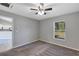 Bright bedroom with access to kitchen and view of backyard at 43 Water Track Dr, Ocala, FL 34472