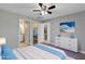 Staged bedroom with neutral walls, walk-in closet, and ensuite bathroom at 43 Water Track Dr, Ocala, FL 34472