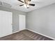 Bright bedroom featuring carpet, ceiling fan and double door closet at 43 Water Track Dr, Ocala, FL 34472