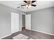 Bedroom with double door closet and ceiling fan at 43 Water Track Dr, Ocala, FL 34472