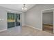 Bright dining space with tile flooring and sliding glass doors offering a view of the outdoors at 43 Water Track Dr, Ocala, FL 34472
