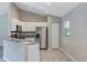 Modern kitchen with stainless steel appliances and granite countertops at 43 Water Track Dr, Ocala, FL 34472