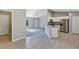 Open concept kitchen with granite counters and stainless steel appliances at 43 Water Track Dr, Ocala, FL 34472