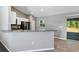 Modern kitchen with granite countertop and stainless steel appliances at 43 Water Track Dr, Ocala, FL 34472
