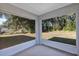 Overlooks a large backyard with mature trees at 43 Water Track Dr, Ocala, FL 34472