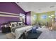 Unique bedroom space that features vibrant colors and a playful decor for of all ages at 4455 Indigo Sky Ln, Kissimmee, FL 34744