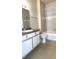 Bathroom with a bathtub, toilet, and vanity with a sink at 5979 Westgate Dr # 1021, Orlando, FL 32835