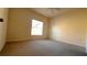 Spacious bedroom with large window and ceiling fan at 5979 Westgate Dr # 1021, Orlando, FL 32835
