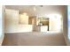 Open living room with views into the kitchen area at 5979 Westgate Dr # 1021, Orlando, FL 32835