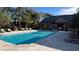 Inviting community pool with surrounding lounge area at 5979 Westgate Dr # 1021, Orlando, FL 32835