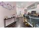 Charming kitchen bar area featuring bar stool seating and a wine glass rack at 657 Hunters Run Blvd, Lakeland, FL 33809