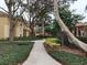 Landscaped walkway leads through the community at 826 Grand Regency Pt # 202, Altamonte Springs, FL 32714