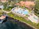 Resort-style community pool and clubhouse with lake access at 8519 Bay Lilly Loop, Kissimmee, FL 34747