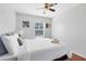 Bedroom with full-size bed and window view at 8519 Bay Lilly Loop, Kissimmee, FL 34747