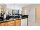 Kitchen with granite counters, double sink, and dishwasher at 8519 Bay Lilly Loop, Kissimmee, FL 34747