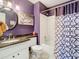 Small bathroom with granite countertop, white vanity, and shower/tub combo at 925 Wintergreen Blvd, Fern Park, FL 32730