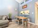 Light and bright dining area with wood table and metal chairs at 925 Wintergreen Blvd, Fern Park, FL 32730