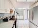Bright kitchen with stainless steel appliances and ample cabinet space at 925 Wintergreen Blvd, Fern Park, FL 32730